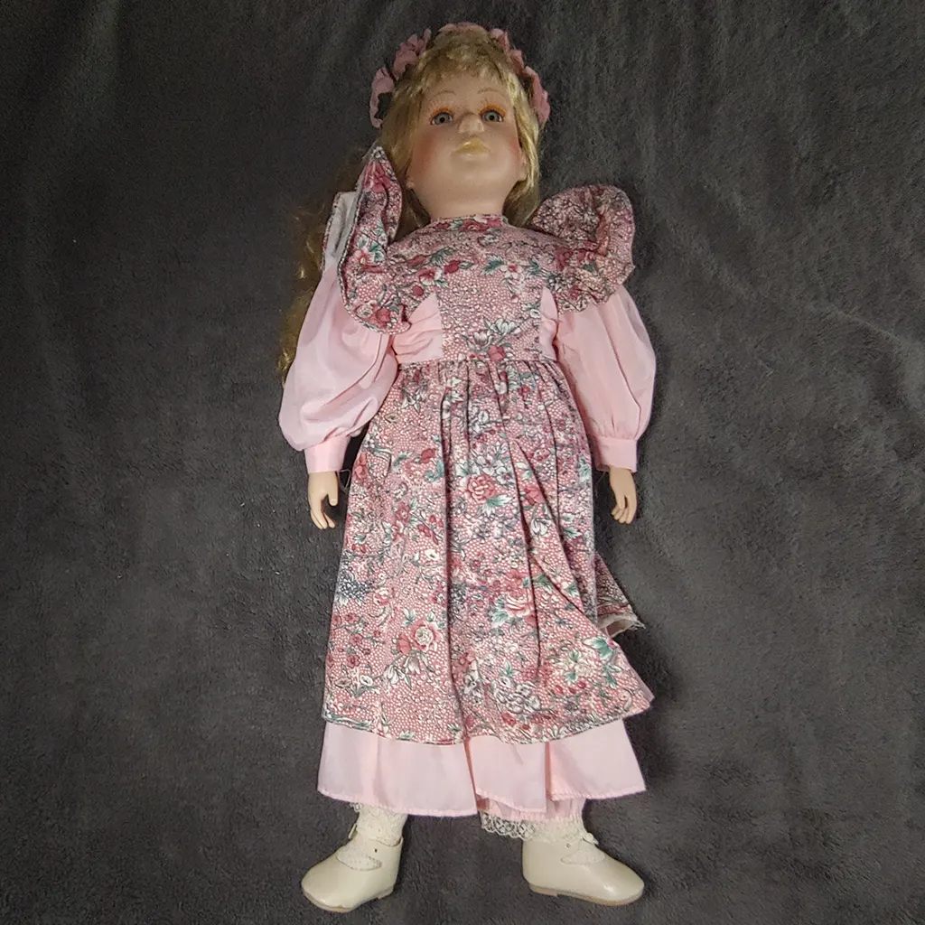 A full photo of the haunted porcelain doll