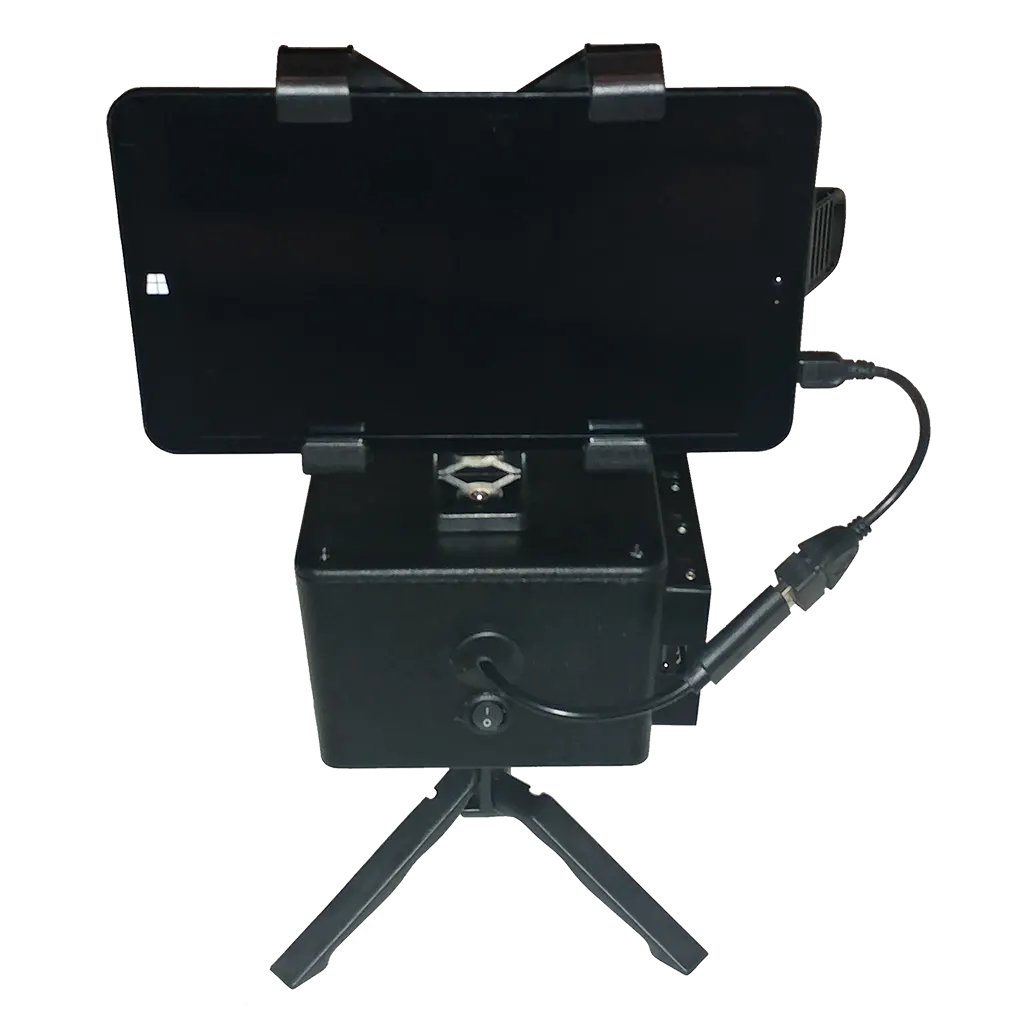A photo of the portable SLS Camera and tablet, on the ground on its tripod stand